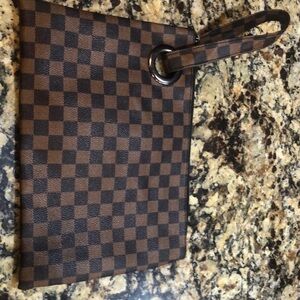 Like new 12”x8 1/2” wristlet